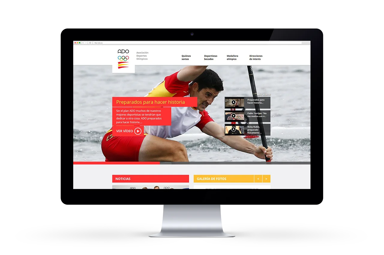 Web de ADO en pantalla de iMac con portada de piragüismo